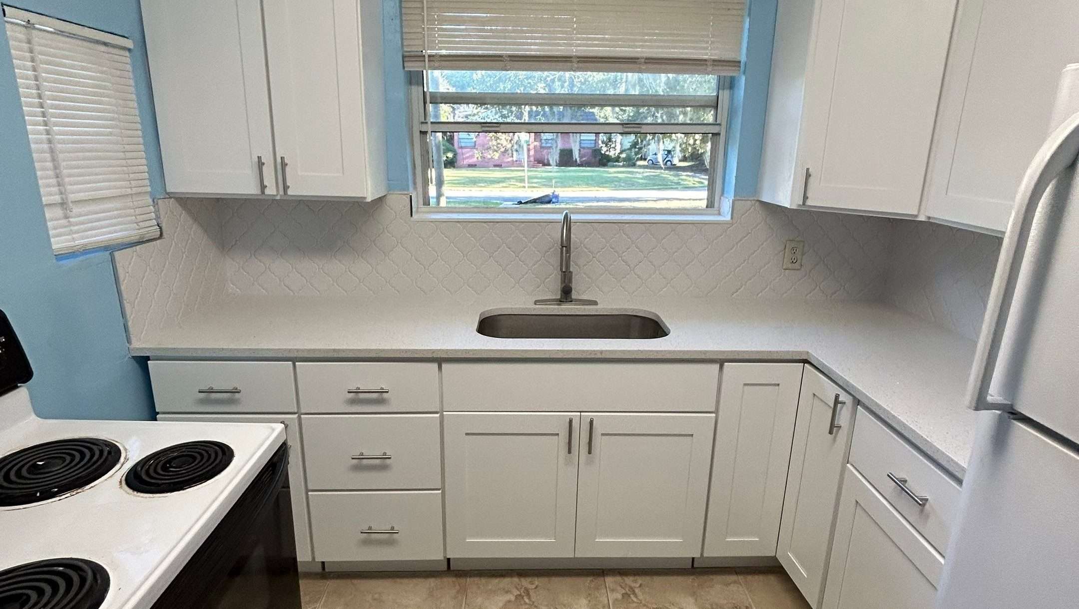 Kitchen renovation near Jacksonville FL turn kitchen into a bright, functional space with custom cabinetry, new countertops, and sleek flooring for a fresh modern appeal.
