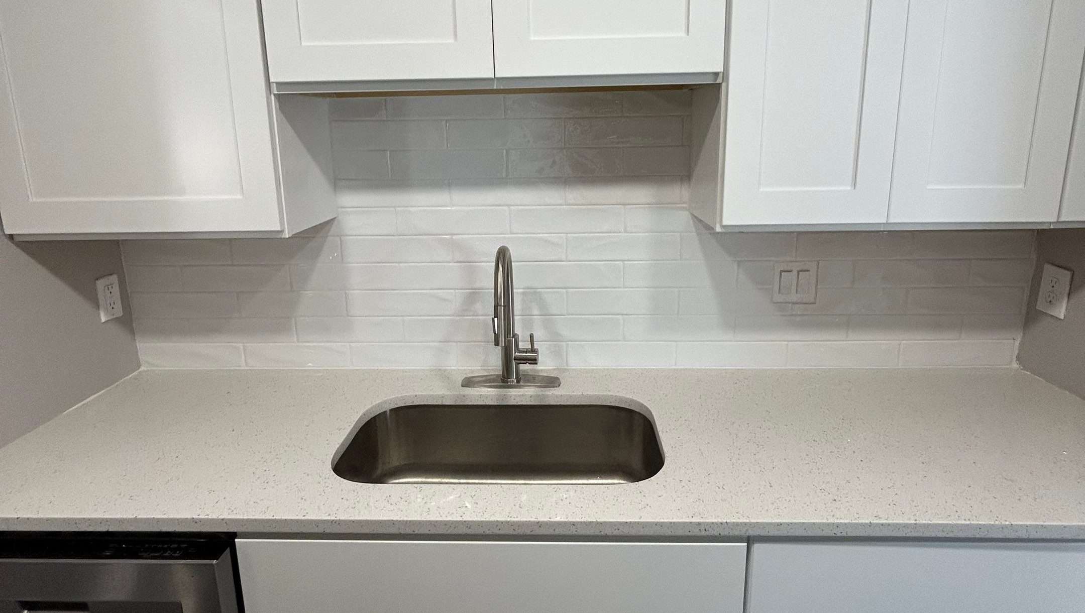 Modern kitchen sink with quartz countertop